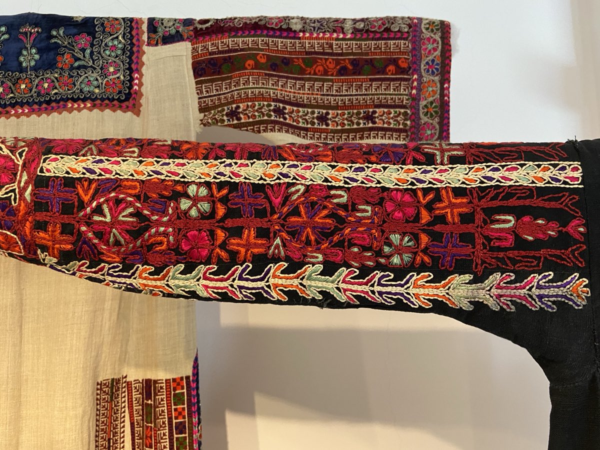 Embroidered thobe sleeves from al-Ne'ane and Bayt Dajan, 1920s — cross-stitch tatreez at the Tiraz collection.