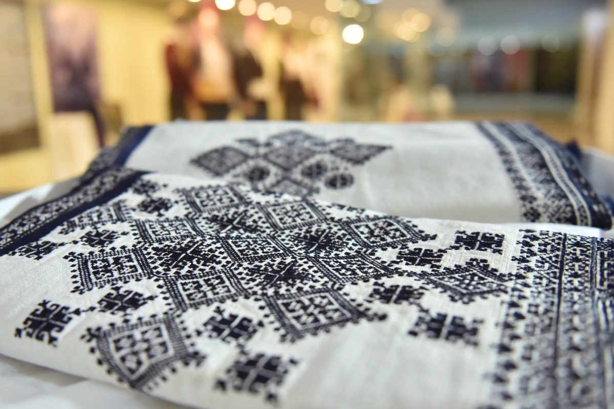 An embroidered sleeve in dense indigo Zmijanje needlework on white cloth, Museum of Republika Srpska.